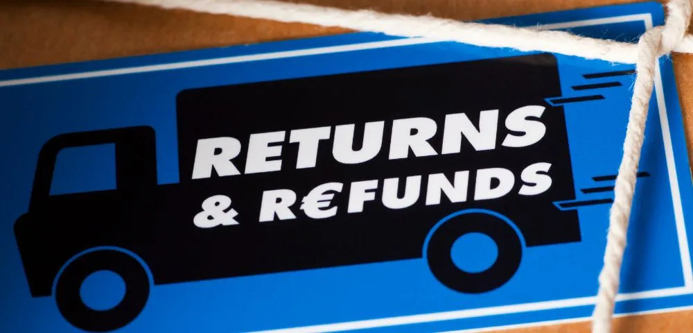 Returns and refunds label on a delivery truck graphic, emphasizing product returns and refund processes related to SuperBox devices.
